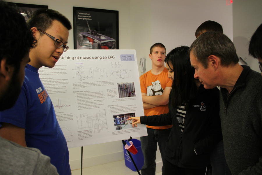 Professor Prucnal inspecting presentation