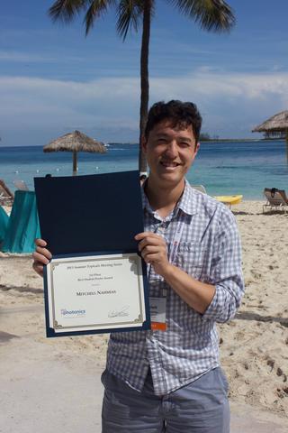 Mitchell Nahmias receives the award in the Bahamas